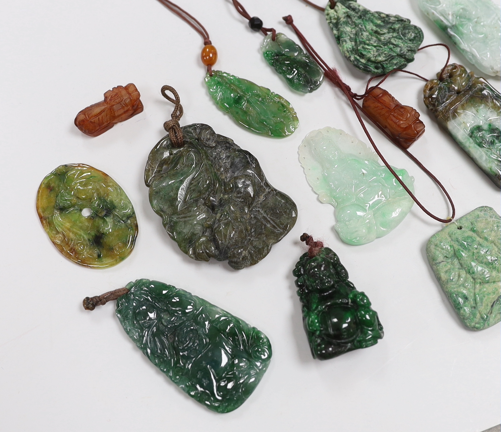 Sixteen Chinese jade or jadeite carvings